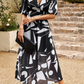 Alma | Blumen Kleid – Romantische Eleganz und strukturierte Ärmel 