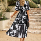 Alma | Blumen Kleid – Romantische Eleganz und strukturierte Ärmel 