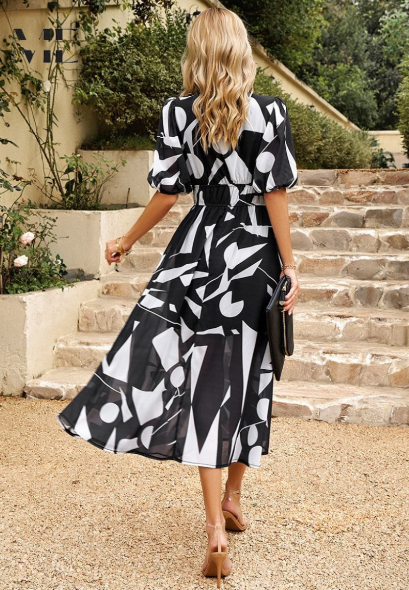 Alma | Blumen Kleid – Romantische Eleganz und strukturierte Ärmel 
